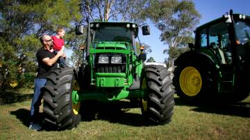 Attendees of a past Tocal Field Day check out a tractor. Picture by Max Mason-Hubers.