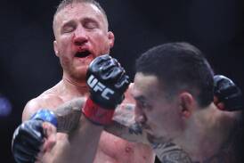 Max Holloway (R) knocks out Justin Gaethje in the fifth round at UFC 300. (AP PHOTO)