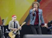 Mick Jagger and the Rolling Stones perform during the New Orleans Jazz and Heritage Festival. (AP PHOTO)