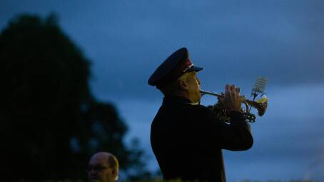 A bugler at the 2024 Maitland Park Anzac Day dawn service. Picture by Jonathan Carroll
