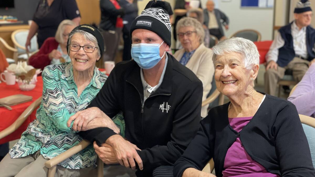 Former NRL star Mark Hughes enjoyed a cuppa and some baked goods with residents at Benhome Masonic Village on Wednesday, June 7. Pictures by Laura Rumbel