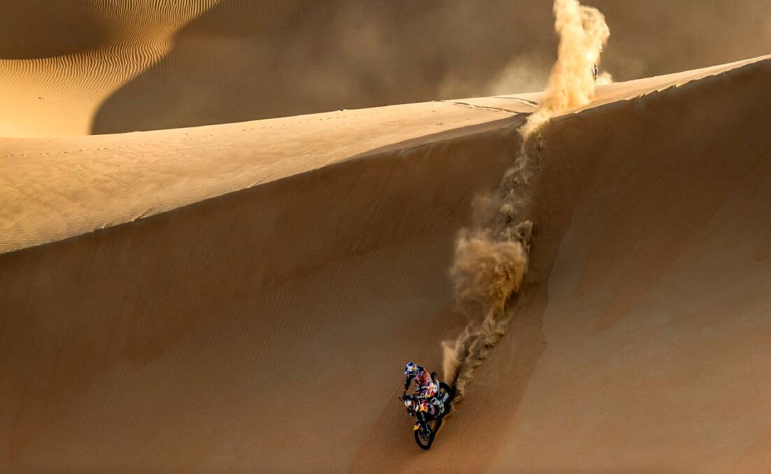 AWESOME: Maitland Toby Price takes on the dunes in Abdu Dhabi. He admitted later on Facebook that he felt so small when he saw this photo. 
