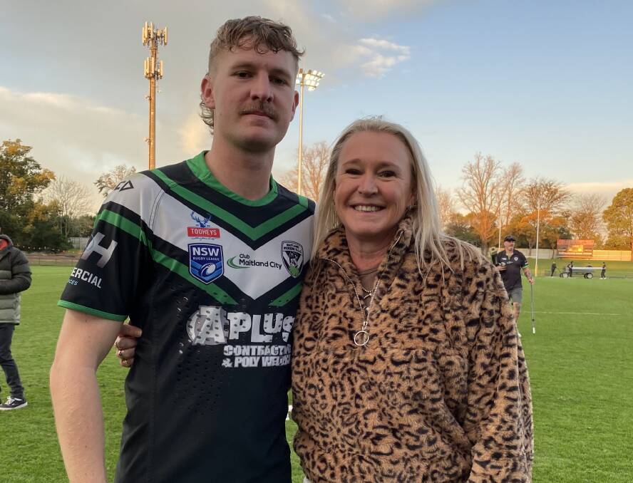 Jackson Eckford and his mum Kim O'Meara celebrate after his first grade debut in which he scored a hat-trick and celebrated with a memorable backflip. Picture by Michael Hartshorn