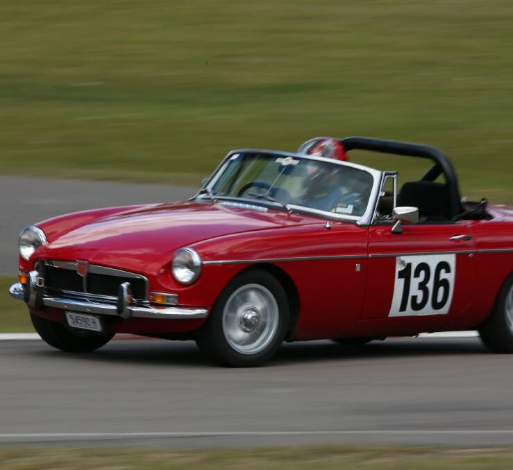 Andy Peters driving an MG B.
