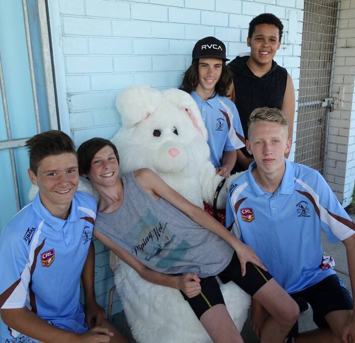 EASTER FUN: Woodberry Warriors under-16 players (back) Christian Nash, Aidan Boehme, (front)  Mitchell Kelly (captain), Andrew Nash and Michael Dunn with the Easter Bunny.