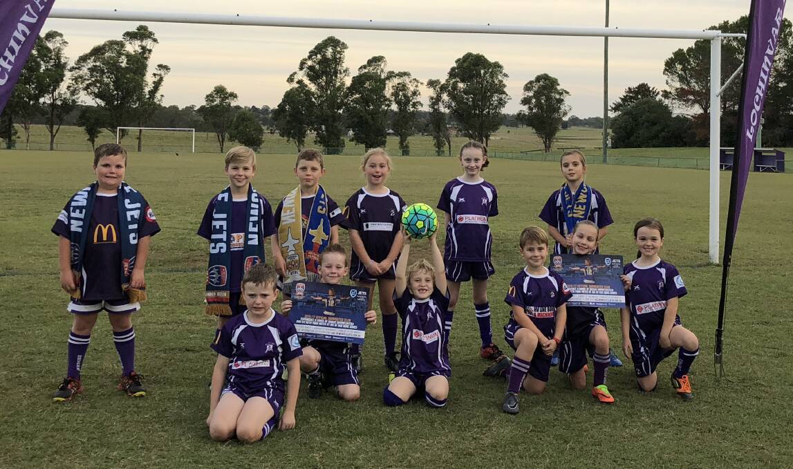 WHAT AN HONOUR: These incredibly lucky youngsters from the Lochinvar Rovers will present the medals to the grand final winners on Saturday night.