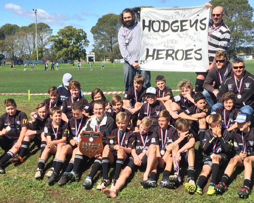 PREMIERS: The Maitland Blacks under 12s with the premiership trophy. Picture: Supplied
