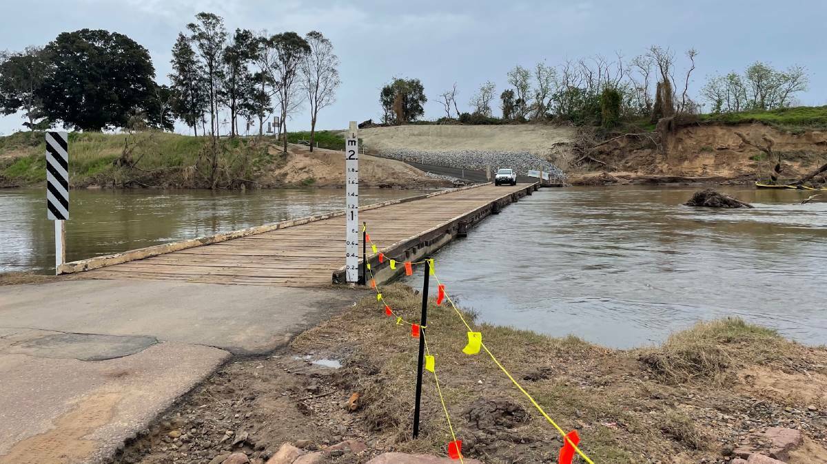 Melville Ford Bridge has been closed by rising waters in the Hunter River. File picture
