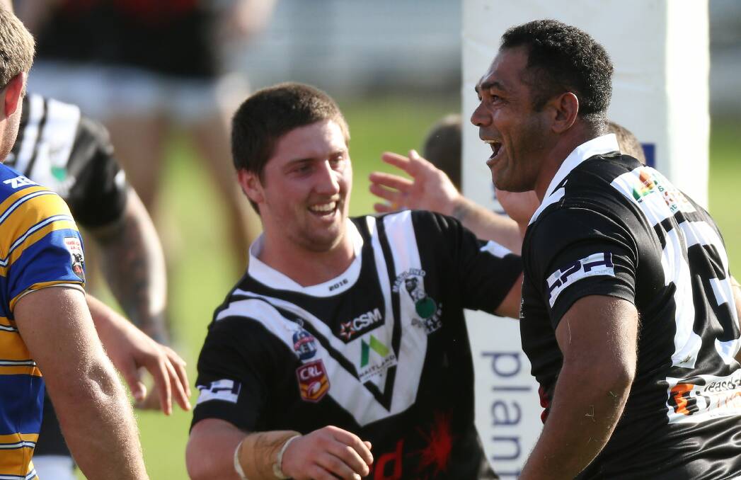 MASTER AND APPRENTICE: PJ Ellis and Jarrod Smith celebrate a try against Lakes United last week. Picture: MARINA NEIL