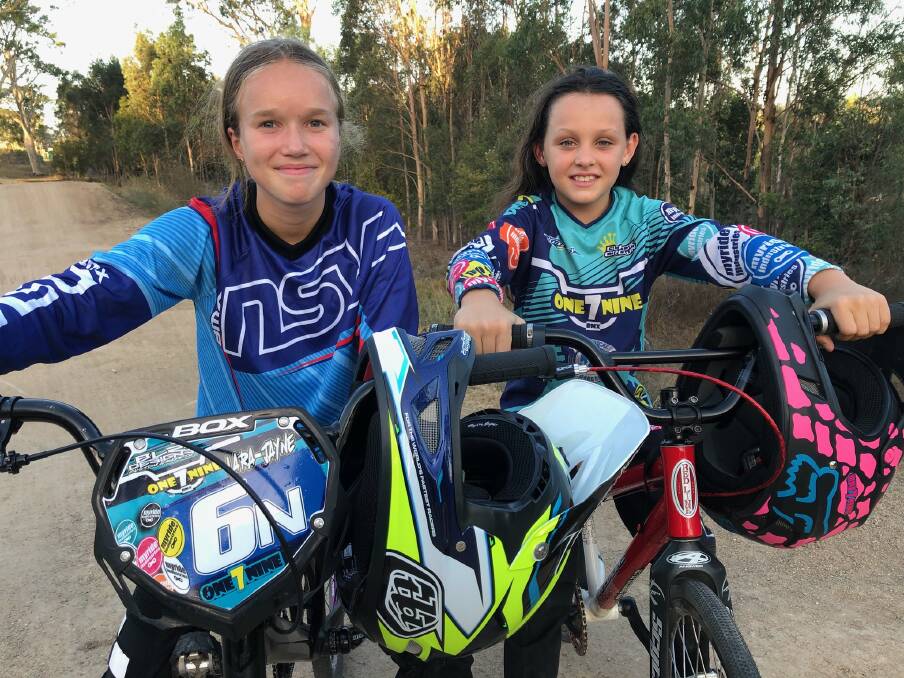 YOUNG CHAMPS: Maitland/Tenambit BMX Club riders Lara-Jayne Haggarty and Zara Monkley. Picture: Supplied