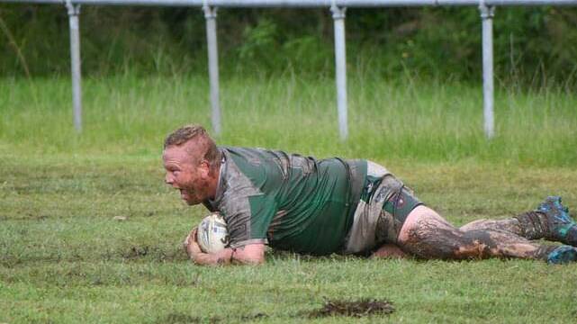 Easts lock Jye Delaney scores a try against West Wallsend in wet and muddy conditions at Les Wakeman Oval on Saturday, April 22. Picture by Jess Delmege