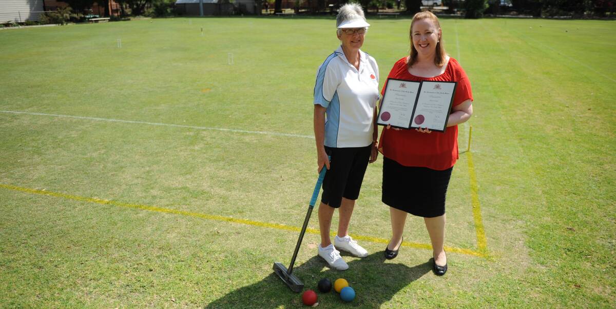 RECOGNITION: Pam Gentle received her award from state member for Maitland Jenny Aitchison at Maitland Croquet Club on Monday.