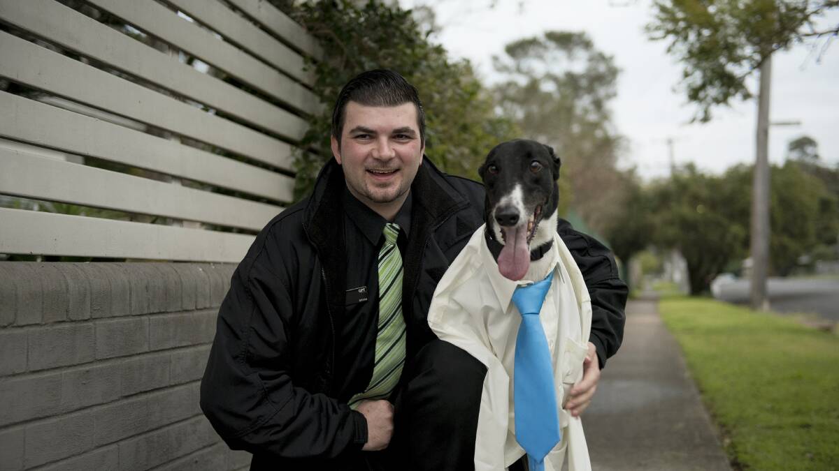 READY FOR BUSINESS: Foster carer Bryan Armstead with Mike Baird, the former racing greyhound now looking for a permanent home. Picture: Perry Duffin