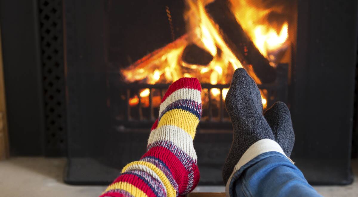 A SPECIAL COMFORT: sSitting around a winter fire with the family, one of life's real joys.