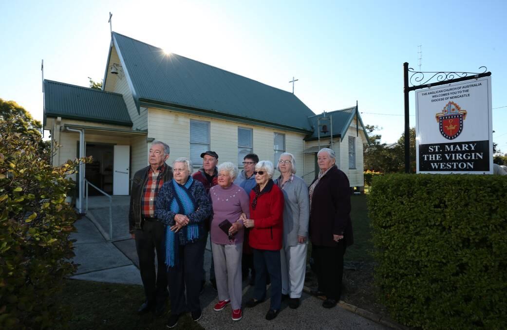 Fire sale: Parishioners at St Mary's Anglican Church, Weston, one of a number of churches the Anglican Diocese of Newcastle has proposed be sold. Picture: Simone De Peak