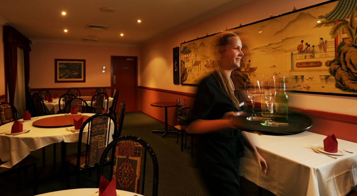 FAMILY FRIENDLY: Waitress Olivia Kuhl at Place One Chinese Restaurant at East Maitland. Picture: Simone De Peak