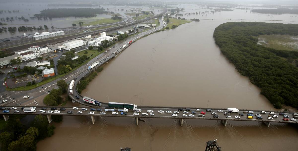  Flood water and traffic at Hexham bridge.