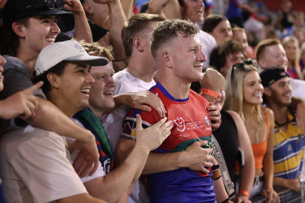Cant with family and friends at McDonald Jones Stadium on Friday after making his NRL debut in Newcastle's 36-20 loss to the Dolphins. Picture Getty Images