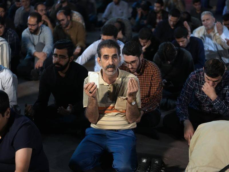 Grieving Iranians can expect a presidential election by early July, according to the constitution. (AP PHOTO)