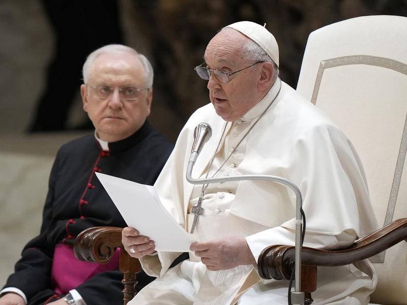 "Dear brothers and sisters, I still have a bit of a cold," the Pope said during his weekly audience. (AP PHOTO)