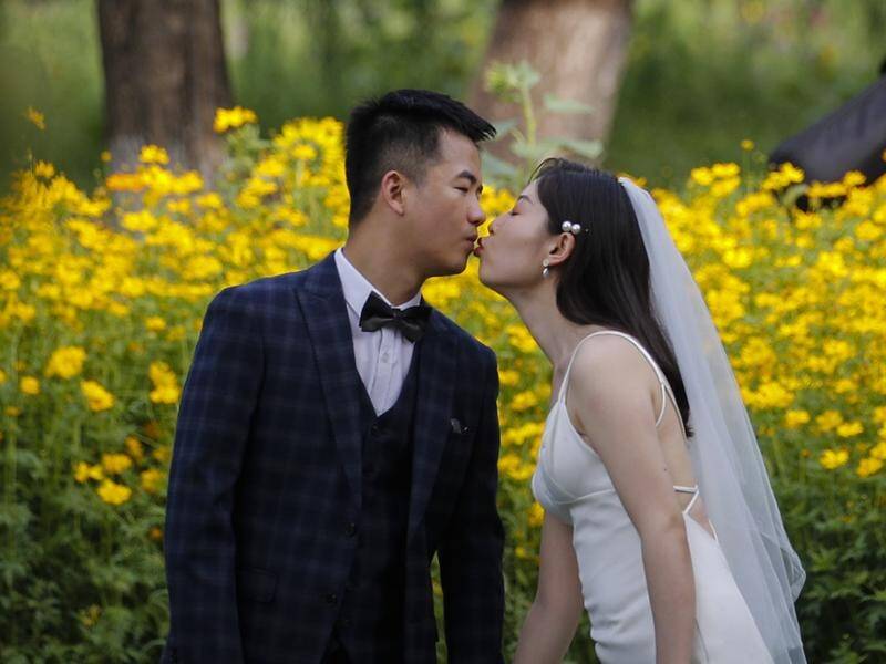 The number of marriages in China hit a record low in 2022. (AP PHOTO)