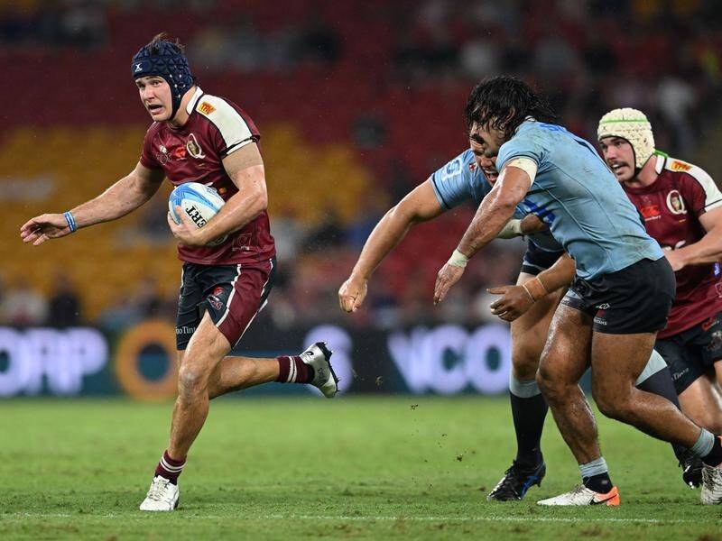 Josh Flook (left) will be toughing it out to help the Queensland Reds and hopefully the Wallabies. (Darren England/AAP PHOTOS)