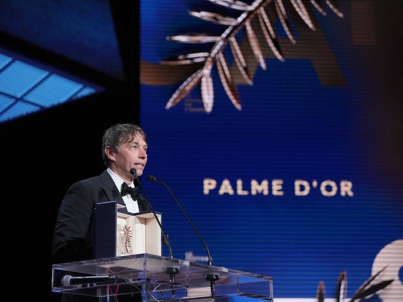 Sean Baker accepts the Palme d'Or for the film Anora, at the 77th Cannes film festival. (AP PHOTO)