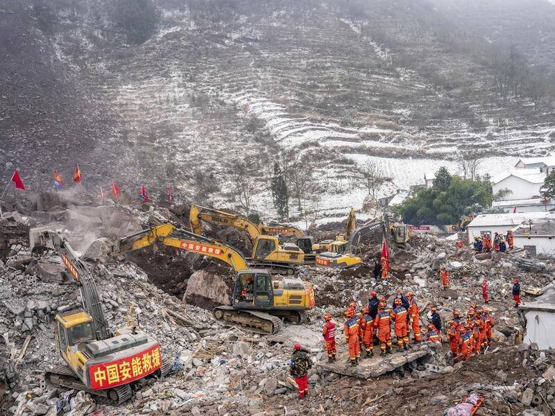 Rescuers are still searching for people missing after a deadly landslide in southwest China. (AP PHOTO)