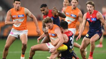 The GWS Giants have outlasted Melbourne to take a two-point win at the MCG. Photo: Julian Smith/AAP PHOTOS